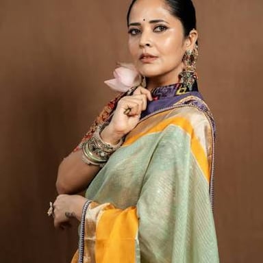A traditional South Asian sari displayed as a long draped garment.
