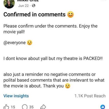 People discussing a movie while one person signals not to reveal plot details.