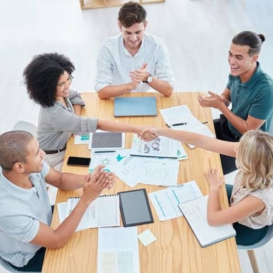A group supporting a mission during a planning meeting.