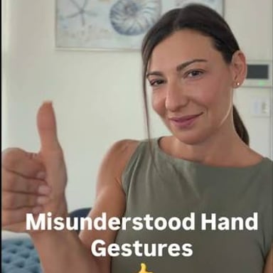 A hand gives a sideways thumb gesture to indicate a middling rating.