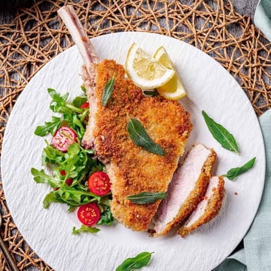A golden, breaded cutlet prepared Milanese-style.