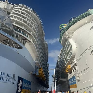 A cruise ship underway on open water.