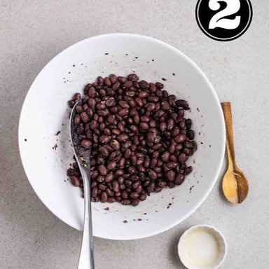Black beans and roasted coffee beans, illustrating two foods called beans.