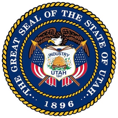 The Utah state seal displaying the motto “Industry.”