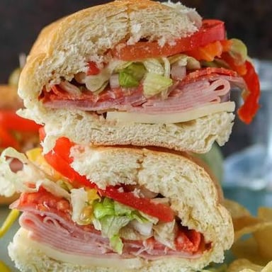 A sandwich made with sliced cold cuts