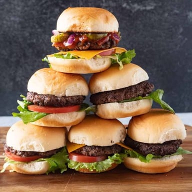 A plate of small slider hamburgers