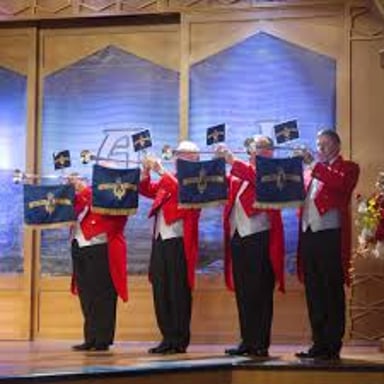 Brass musicians performing a bright ceremonial fanfare