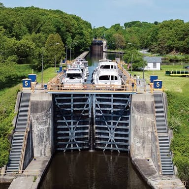 A boat passing through a lock on New York's Erie Canal.