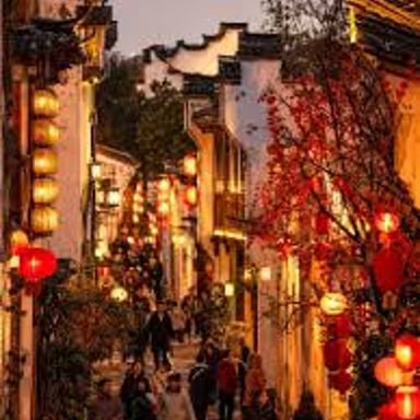 A street with several buildings and places to visit.