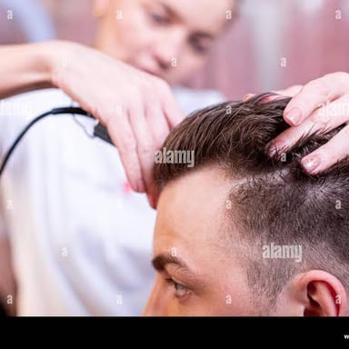 A pair of hair clippers used for cutting hair.