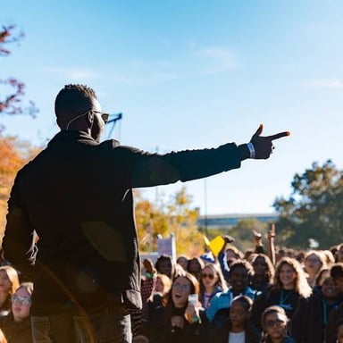 A speaker addressing an attentive audience.
