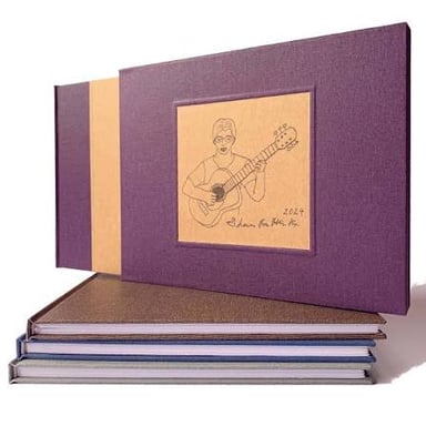 A hardcover book partially enclosed in a protective slipcase.