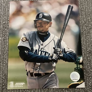 Ichiro Suzuki batting in a Seattle Mariners uniform.