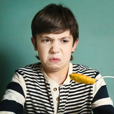 A person showing a strong expression of disgust.