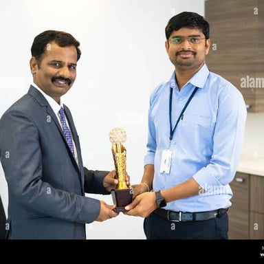 A person is being recognized for an achievement.