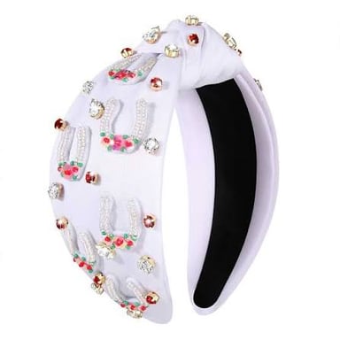 A curved headband displayed as a hair accessory