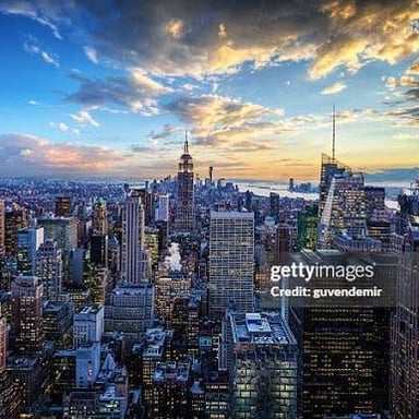 A wide view showing a city skyline and its surrounding area.