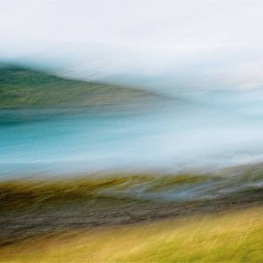 A landscape partly obscured by fog, with details difficult to make out.