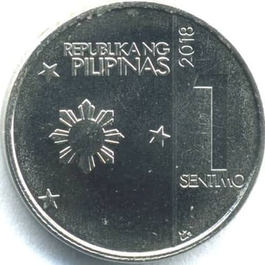 A centavo coin, a subdivision used in some peso currencies.