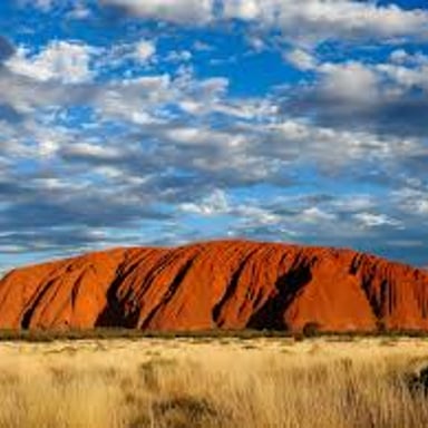Uluru, a large red sandstone formation in Australia.
