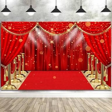 A brightly decorated red carpet scene with glittering lights