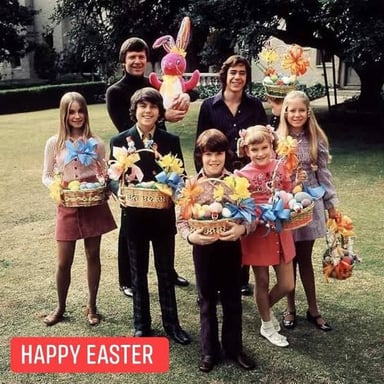Carol Brady with the Brady family.