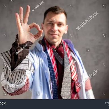 A person making an unusual gesture.