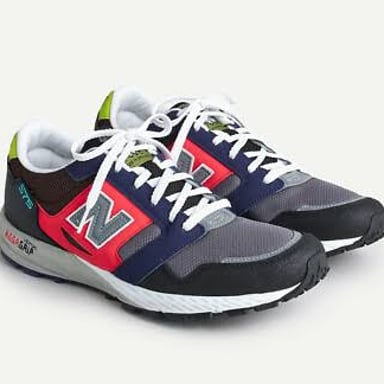 A pair of athletic shoes known as trainers in British English.