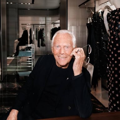 A portrait of Italian fashion designer Giorgio Armani.