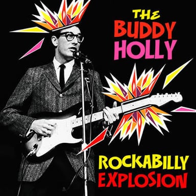 Buddy Holly performing with a guitar.