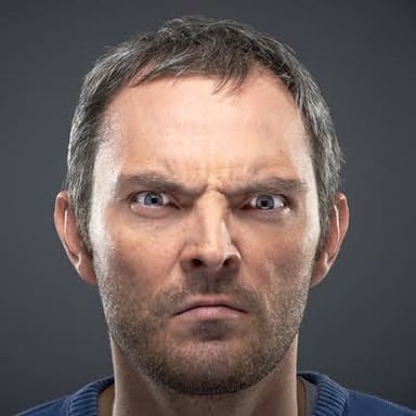 A person showing a visibly angry expression.