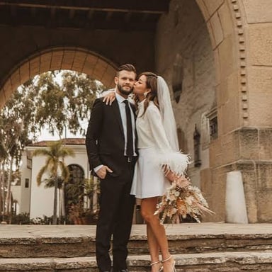 A couple at a small courthouse wedding.
