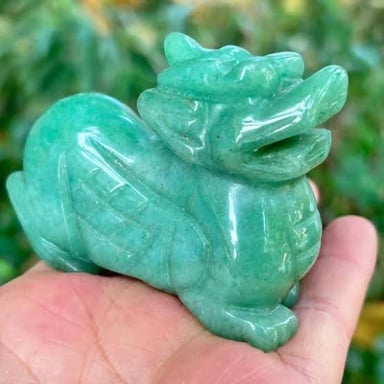 A sculpture carved from green jade.