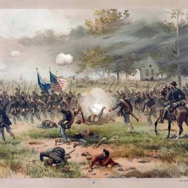 Opposing forces meet on a battlefield.