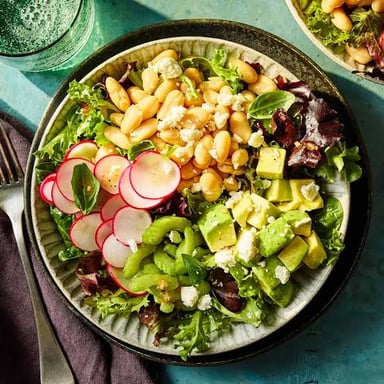 A meal made with vegetables, grains, and beans.