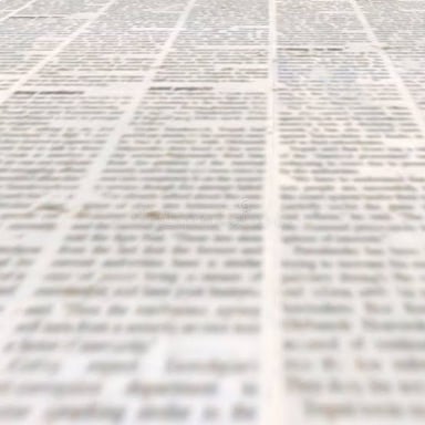 A newspaper page with a brief news item printed in a column.