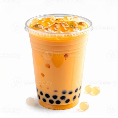 A cup of bubble tea with tapioca pearls at the bottom.