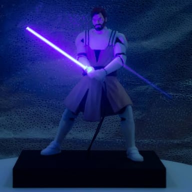 A Jedi character holding a glowing lightsaber.