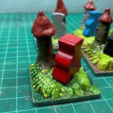 A Kingdomino starting tile featuring a castle