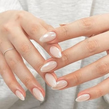 A manicure featuring oval-shaped fingernails