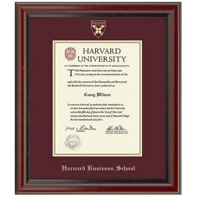 A business school graduate holding a diploma