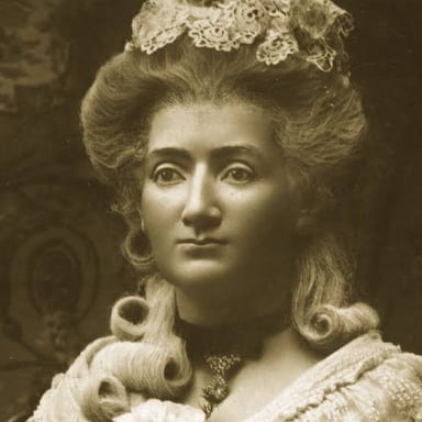 Lifelike wax figures displayed at a Madame Tussauds museum.