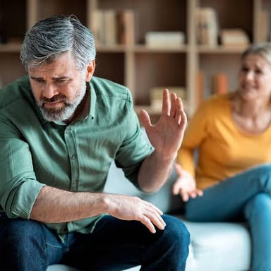 Two people speaking in a straightforward, serious conversation.