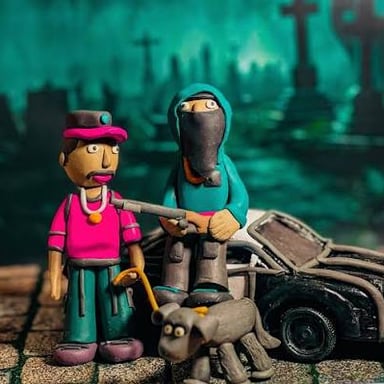 Small clay figures arranged for stop-motion animation.