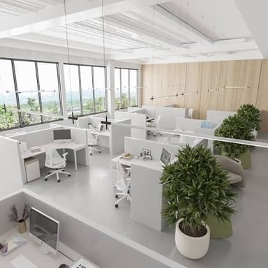 A shared office workspace with desks arranged in an open layout.