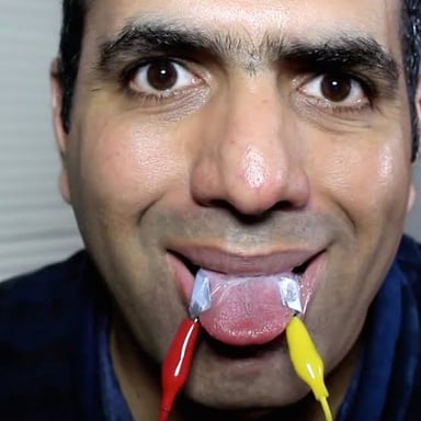 A person clicking their tongue to express disapproval.