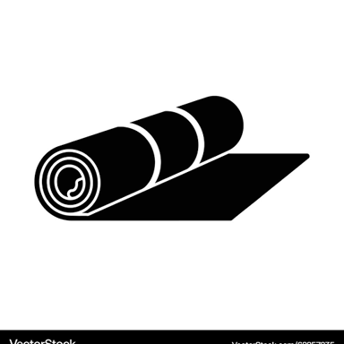 A yoga mat laid out on the floor, with another rolled up nearby.