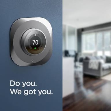 A Google Nest smart thermostat used to control a home's heating and cooling.