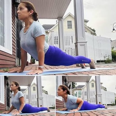 A person demonstrating cobra pose, a yoga posture performed while lying face down.