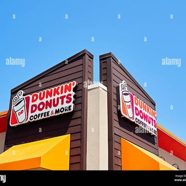 A Dunkin’ storefront displaying the chain’s current brand name.